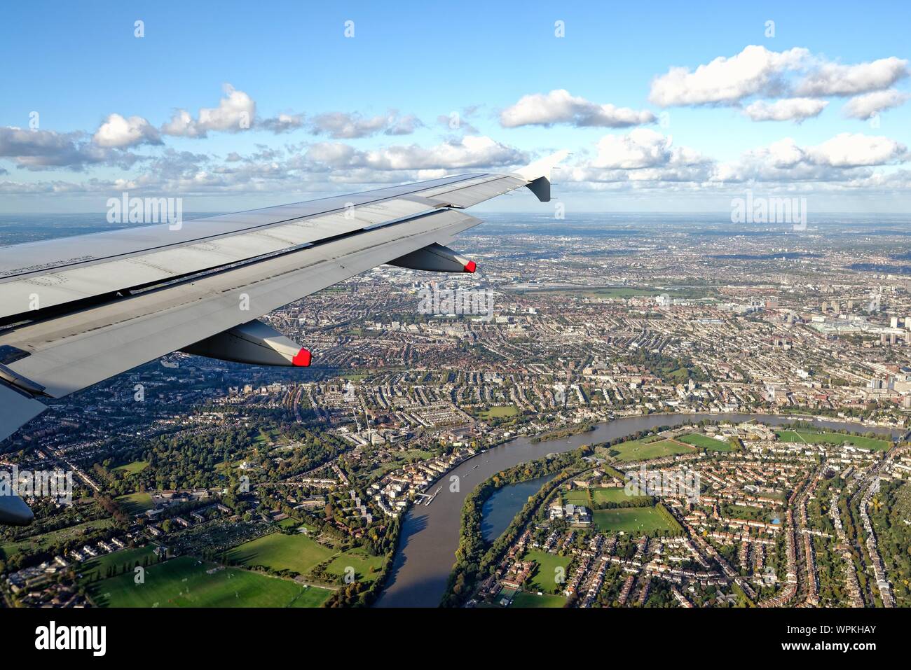 An aerial  view of west London as seen from a passenger jet plane on a flight path to Heathrow airport , England UK Stock Photo