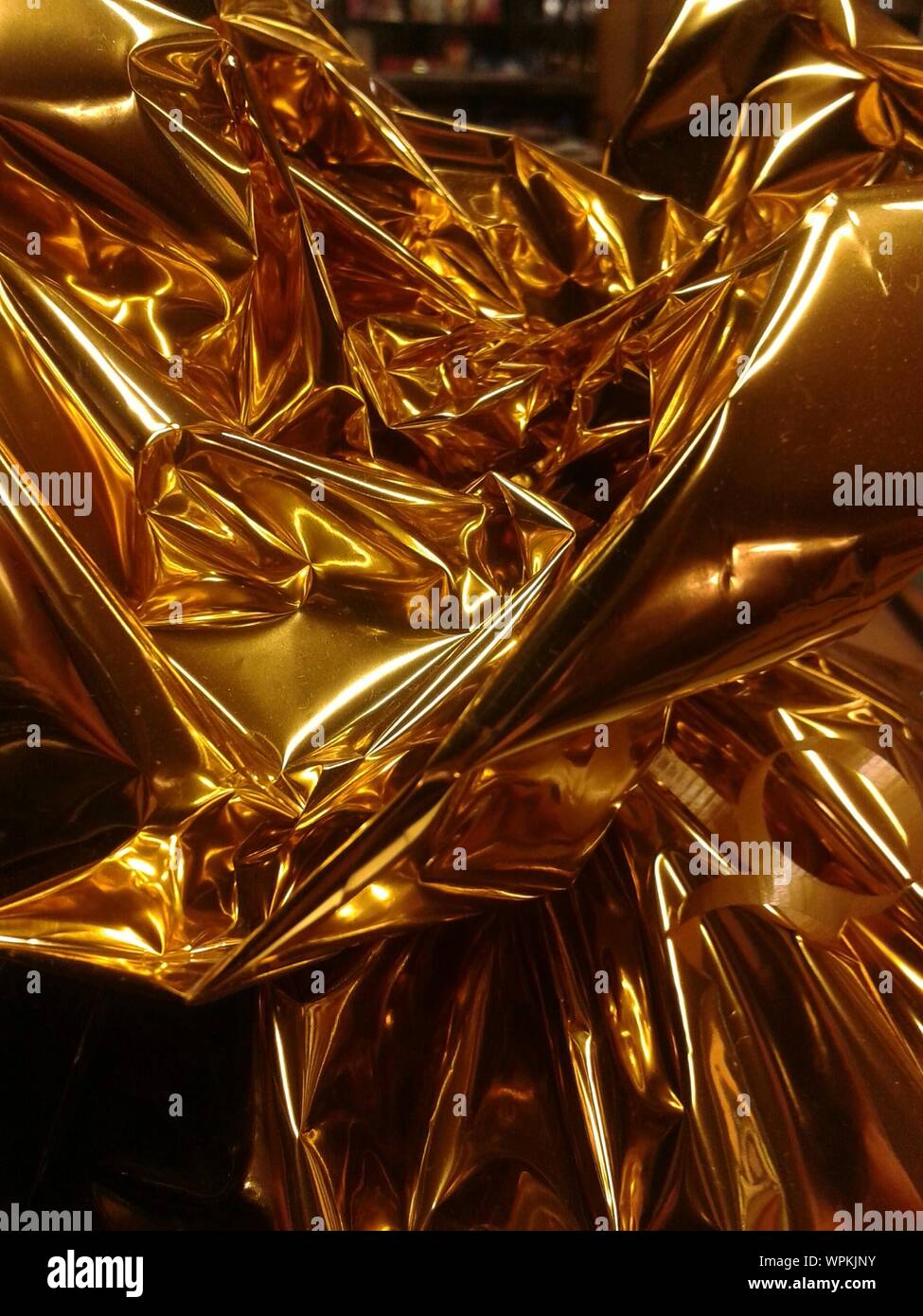 Gold paper wrapping hires stock photography and images Alamy