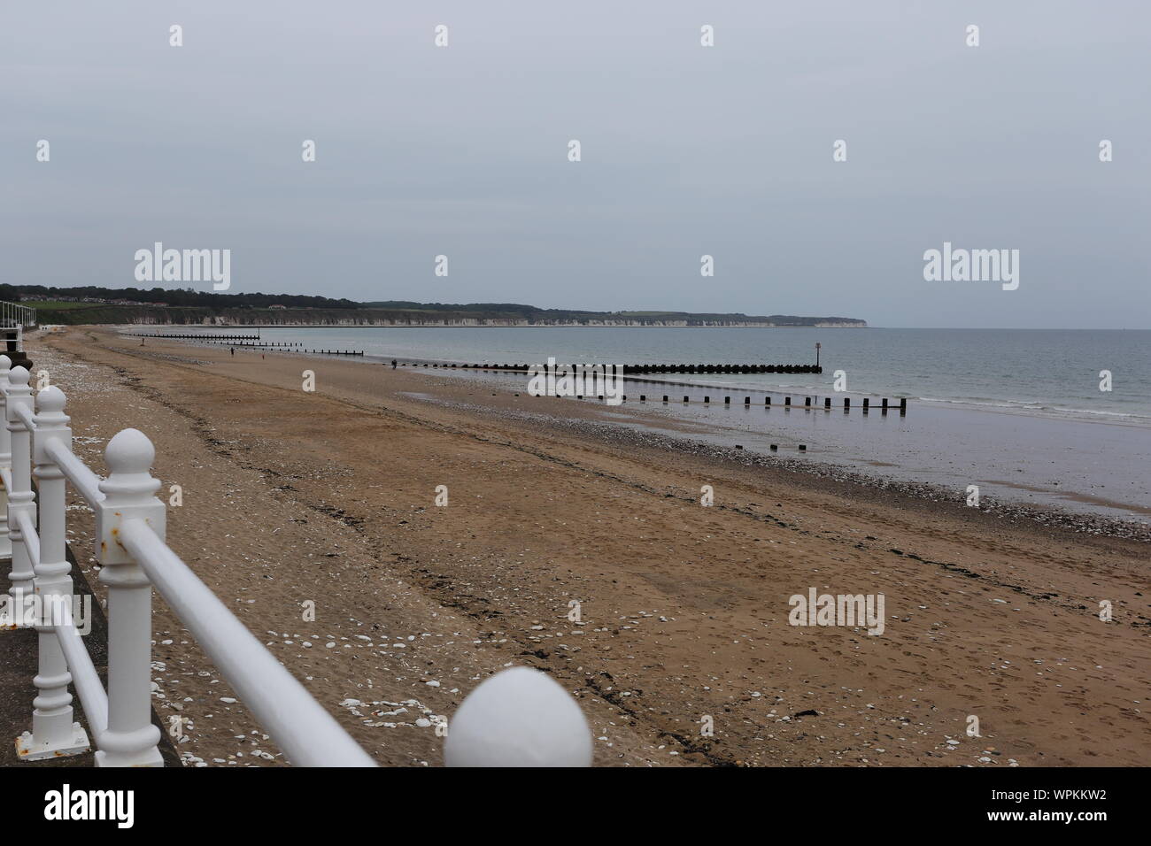 An expansive view of Bridlington north beach showing most of the beach right up to the Flamborough peninsula Stock Photo