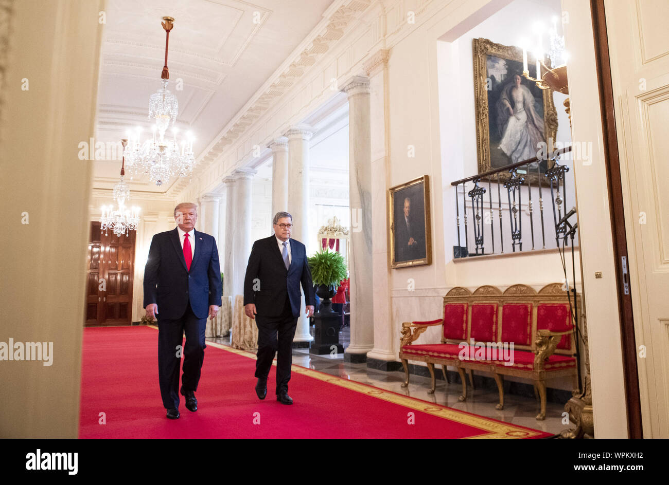 Washington, United States. 09th Sep, 2019. President Donald Trump (L) and Attorney General William Barr walk to the East Room to award the Public Safety Officer Medal of Valor and Heroic Commendations, at the White House in Washington, DC on Monday, September 9, 2019. Trump recognized the six Dayton officers who stoped a mass shooting on August 4th and also honored 5 civilians who helped during a mass shooting at a Walmart in El Paso a day earlier. Photo by Kevin Dietsch/UPI Credit: UPI/Alamy Live News Stock Photo