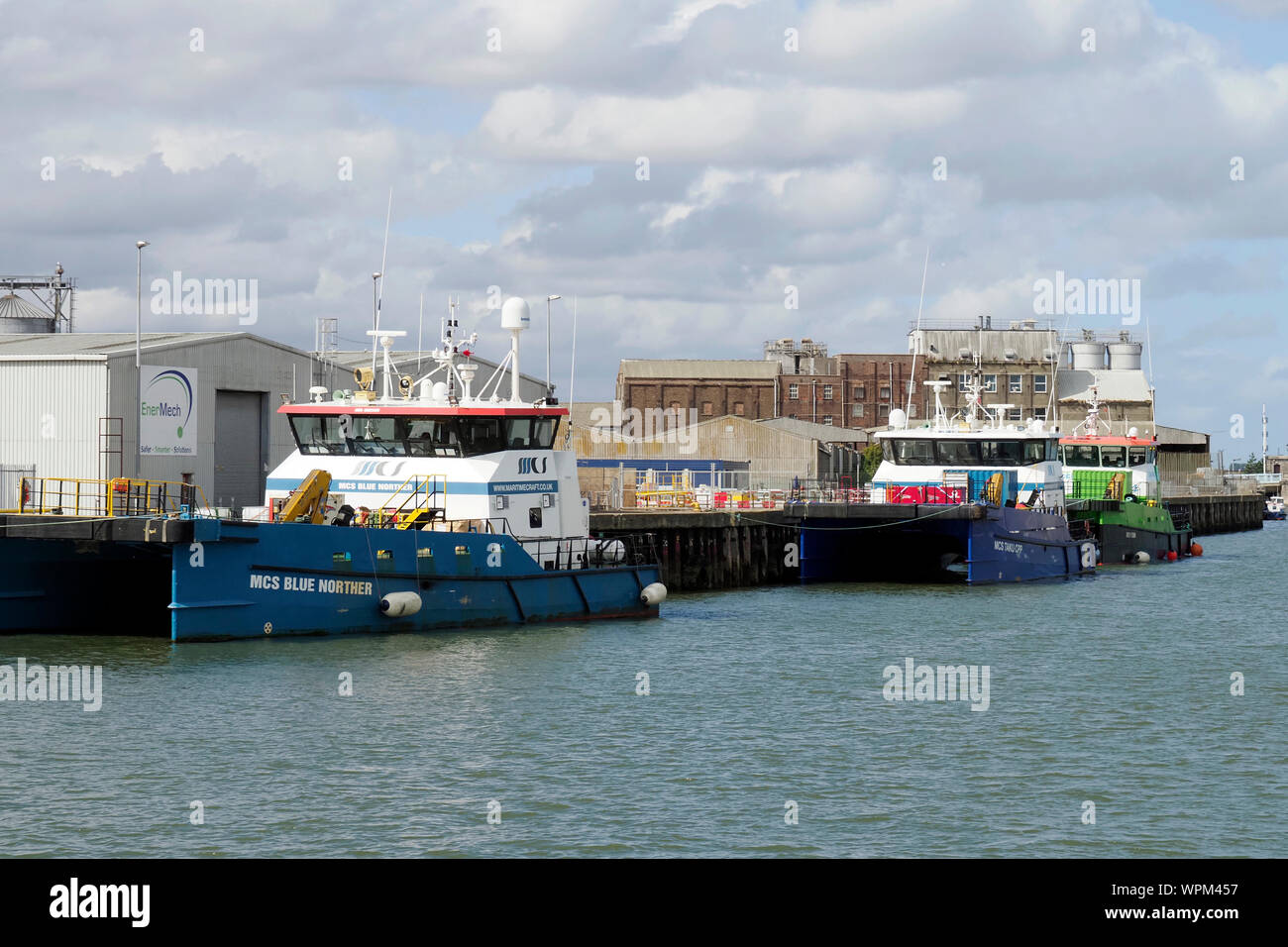 Marine Craft Services (MCS) crew transfer vessels moored on the Gorleston side of the port of Great Yarmouth. Stock Photo