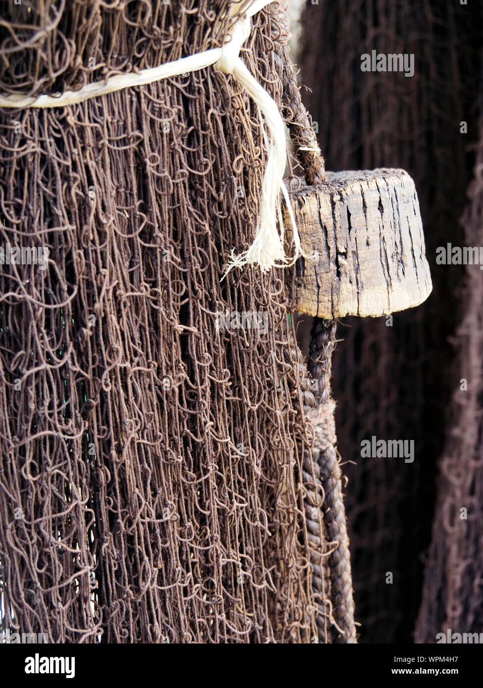 AN old drift net with cork floats hangs over the mizzen sail boom on the  Lydia Eva, the only surviving steam drifter fishing boat Stock Photo - Alamy