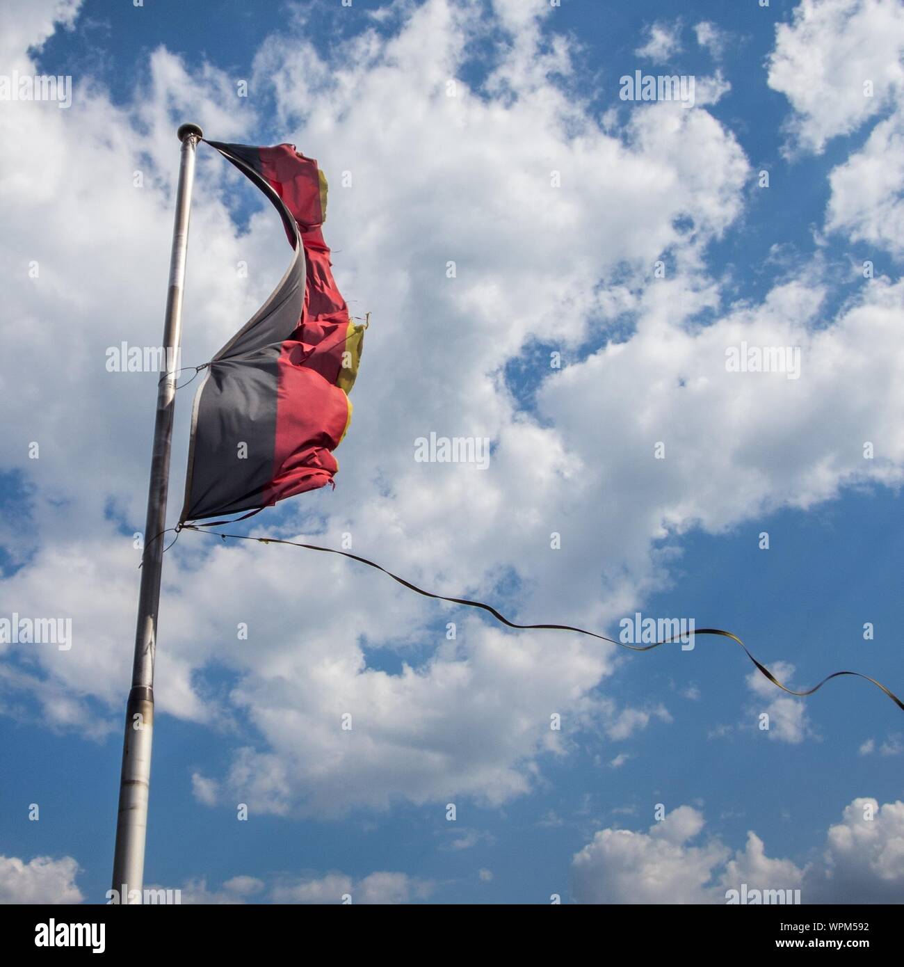 Low Angle View Of Flag In Wind Stock Photo