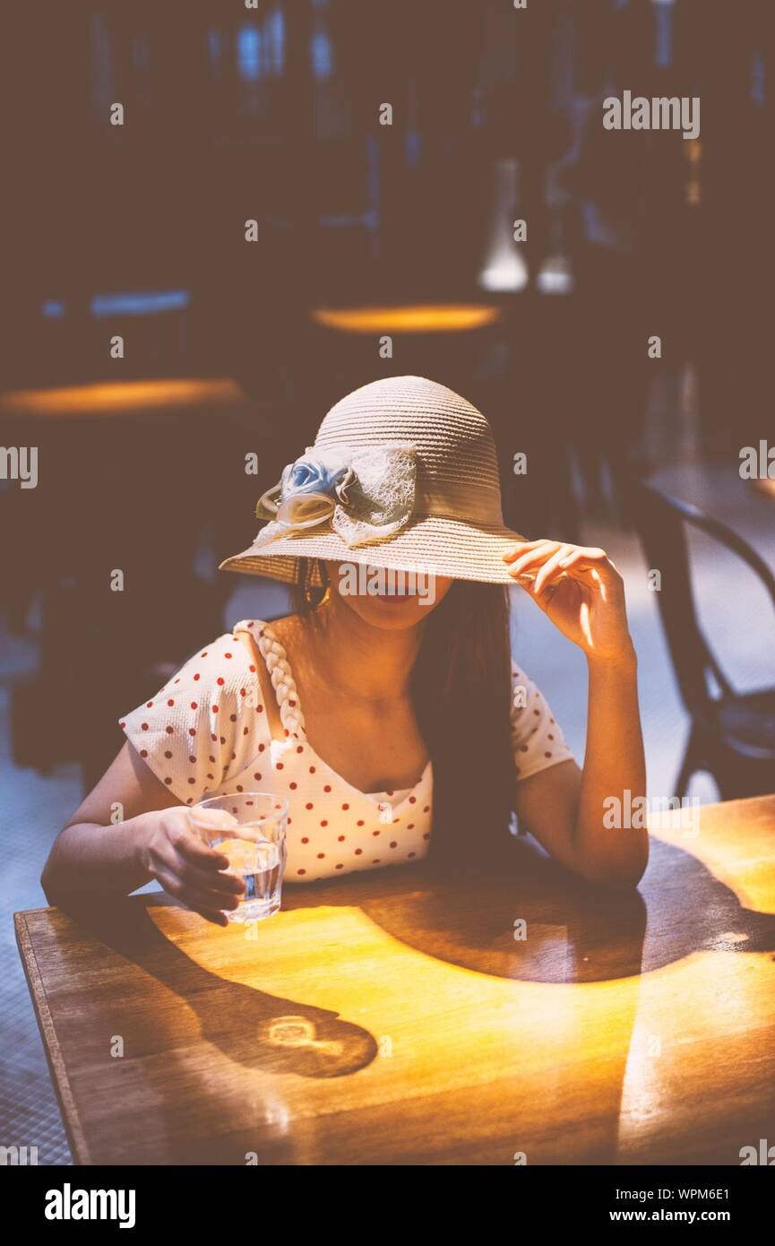 women wearing hats indoors