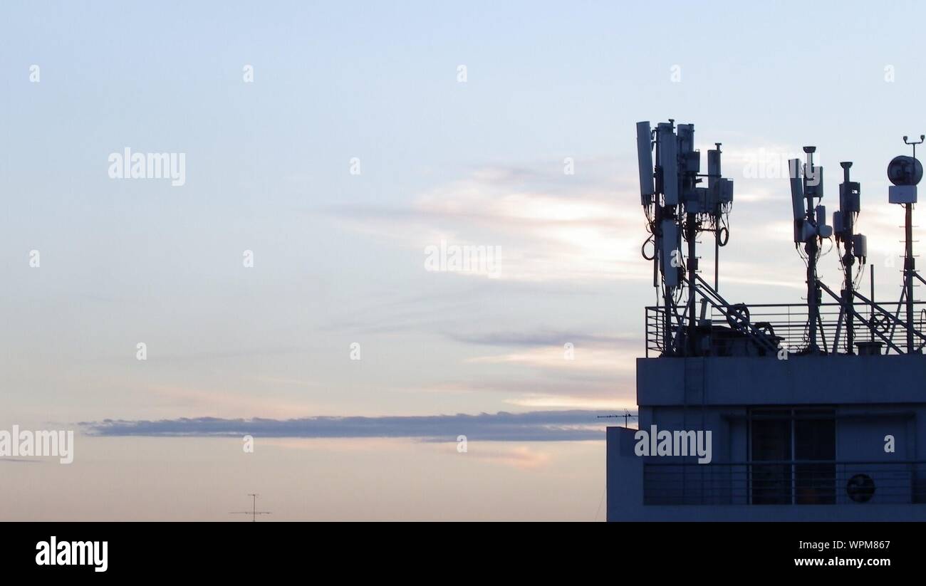 View Of Telecommunications Equipment Against Sky Stock Photo