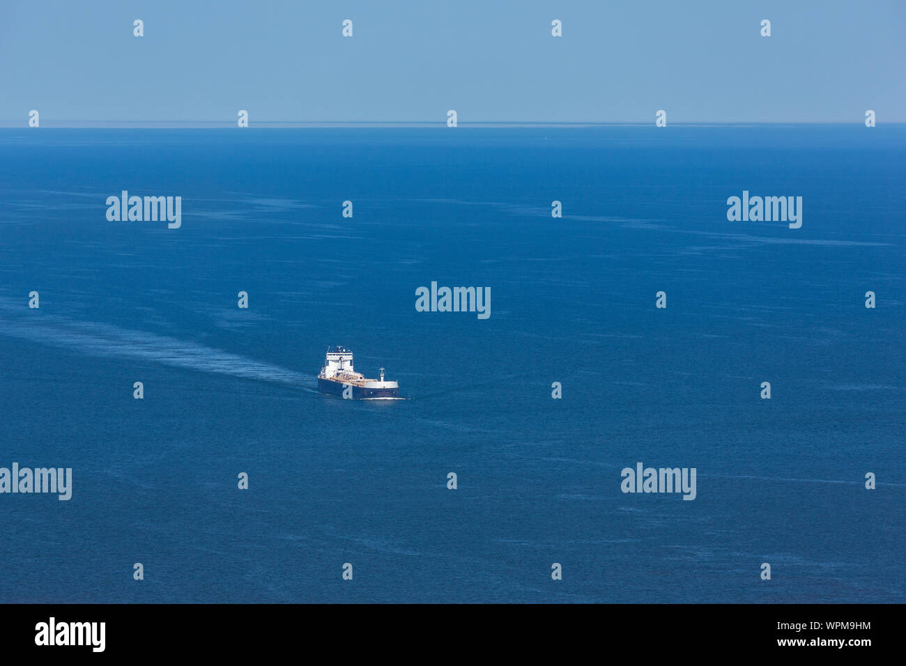 A Ship Traveling On Lake Superior Stock Photo