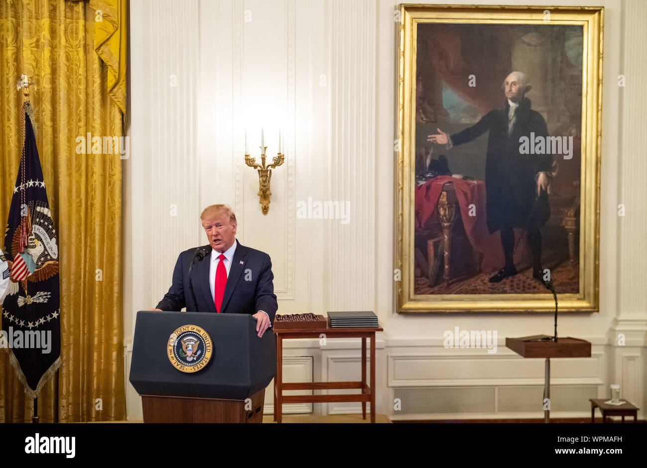 Washington, United States. 09th Sep, 2019. President Donald Trump delivers remarks before awarding the Public Safety Officer Medal of Valor and Heroic Commendations, during a ceremony in the East Room at the White House in Washington, DC on Monday, September 9, 2019. Trump recognized the six Dayton police officers who stoped a mass shooting on August 4th and honored 5 civilians who helped during a mass shooting at a Walmart in El Paso the day before. Photo by Kevin Dietsch/UPI Credit: UPI/Alamy Live News Stock Photo