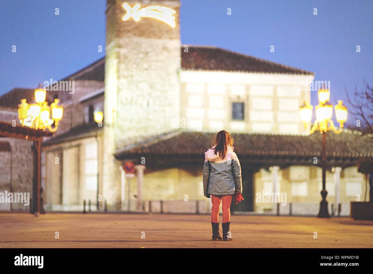 Girl standing in street hi-res stock photography and images - Alamy