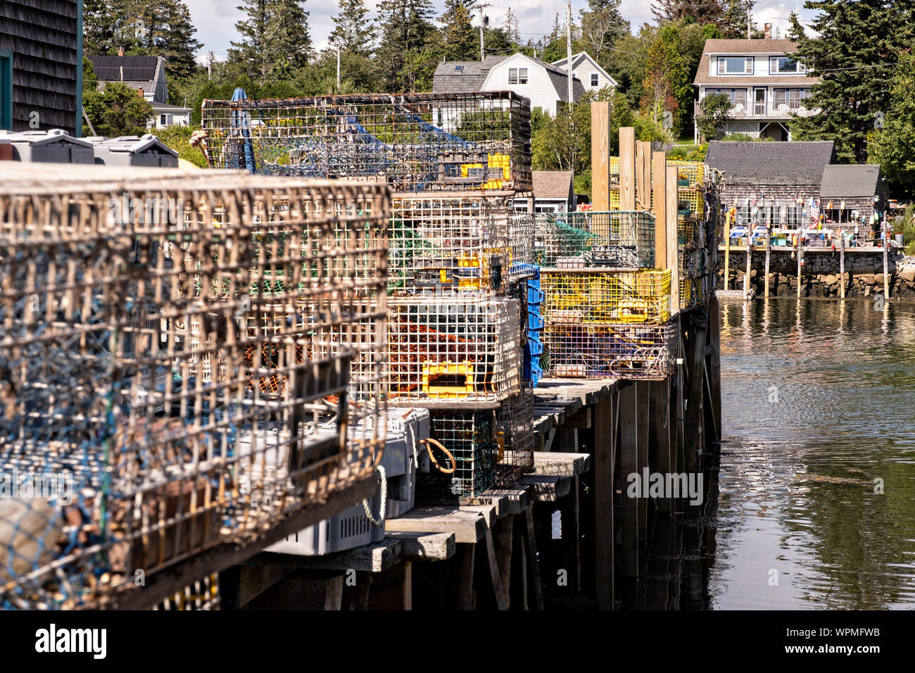 The lobster docks and pier piled high with traps in the quaint fishing