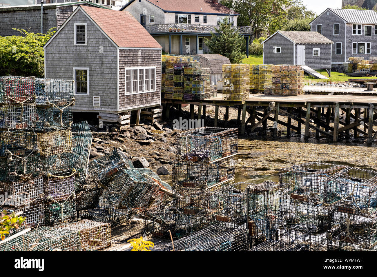 The lobster docks and pier piled high with traps in the quaint fishing