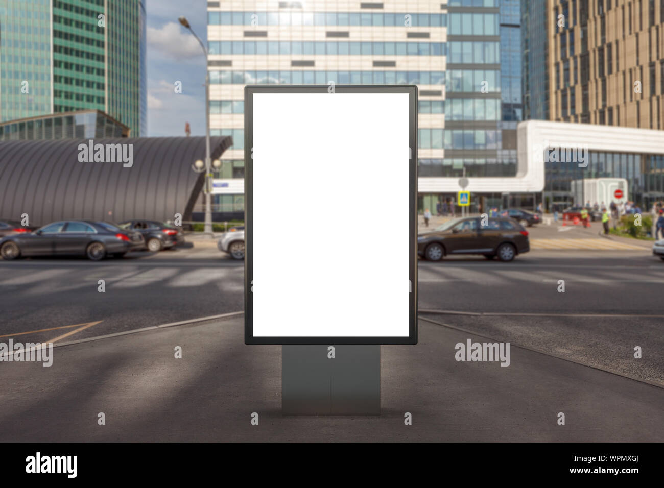 Blank street billboard poster stand mock up on city business district ...