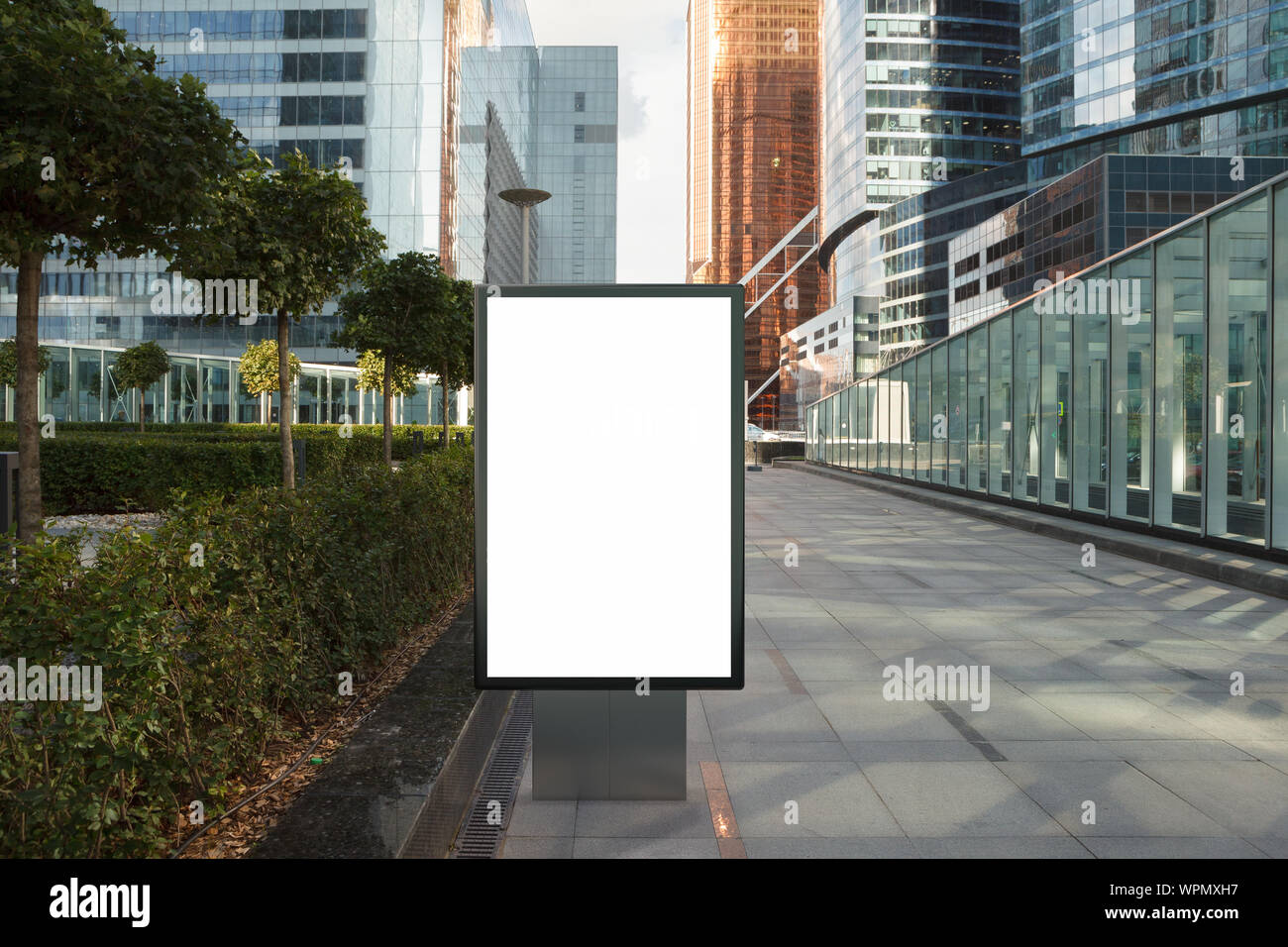 Blank street billboard poster stand mock up on city business district ...