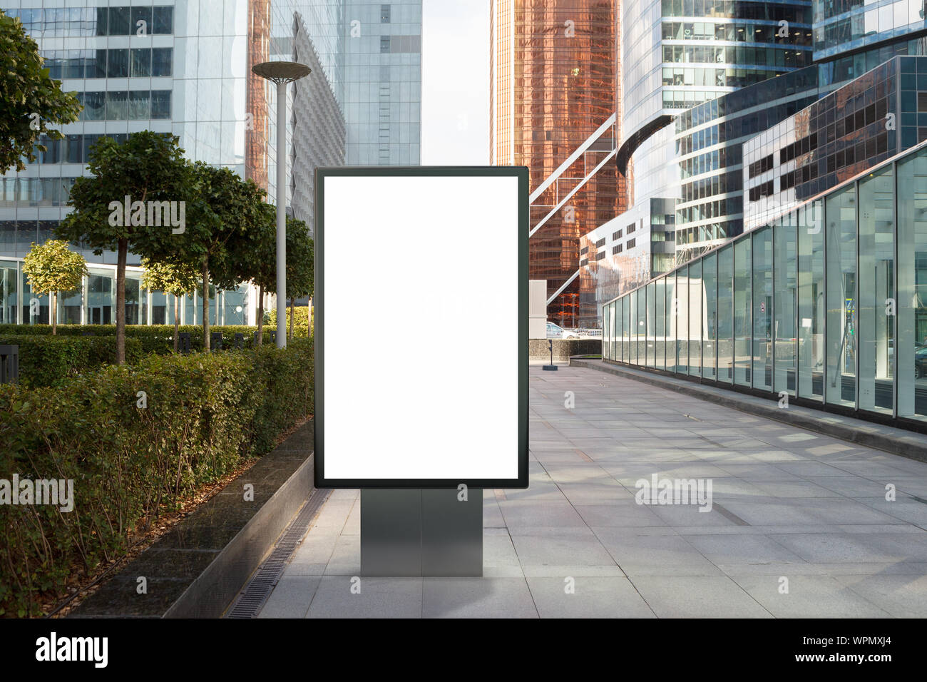 Blank street billboard poster stand mock up on city business district ...