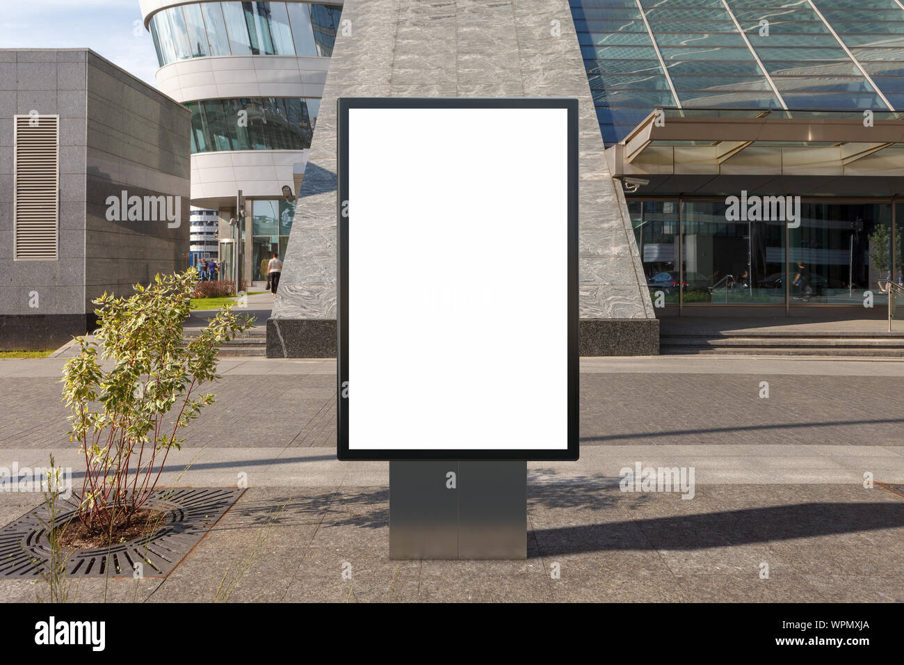 Blank street billboard poster stand mock up on city business district ...
