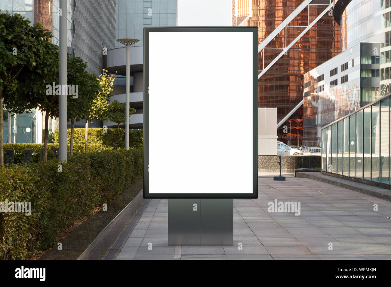 Blank street billboard poster stand mock up on city business district ...
