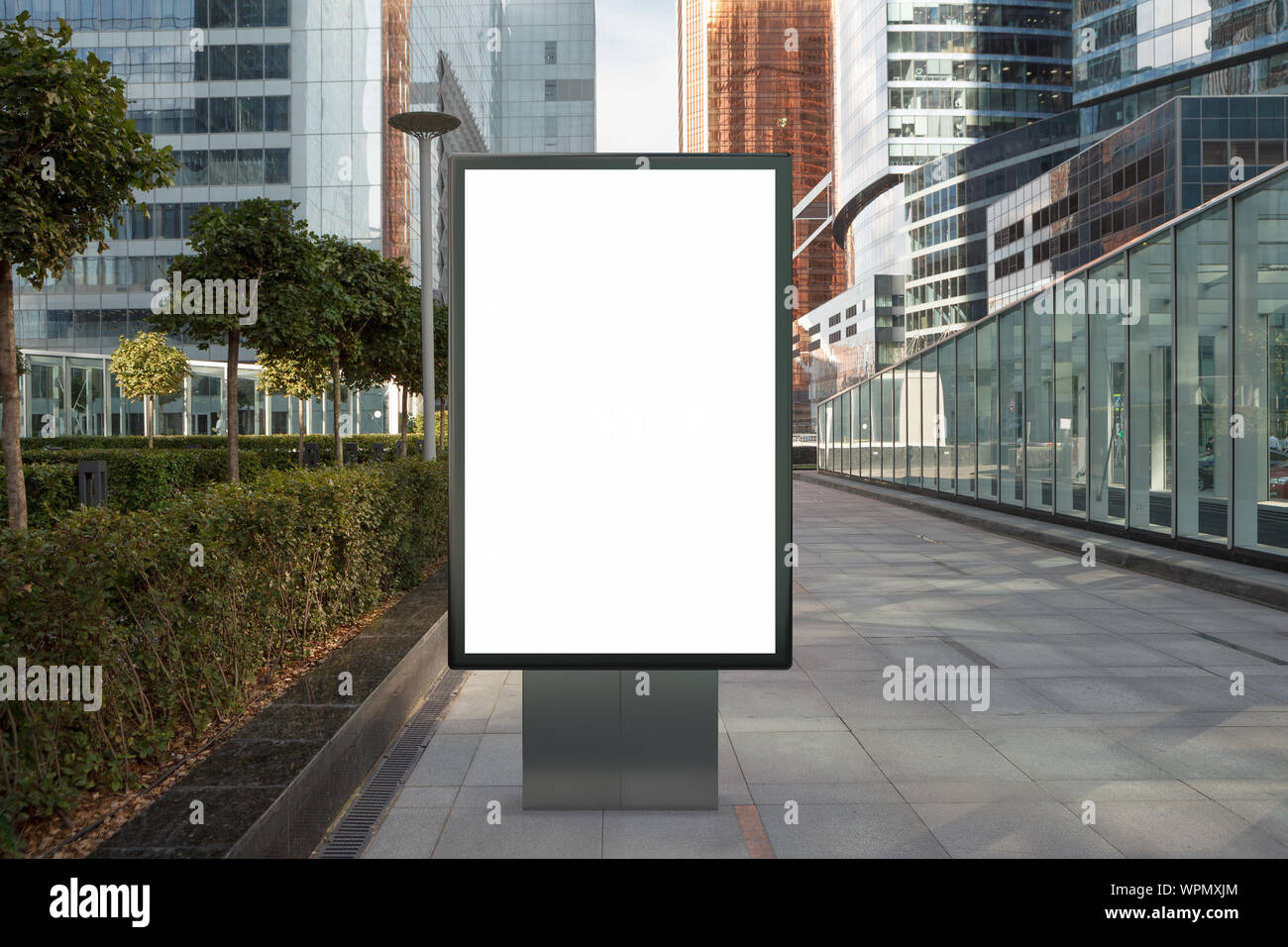 Blank street billboard poster stand mock up on city business district ...