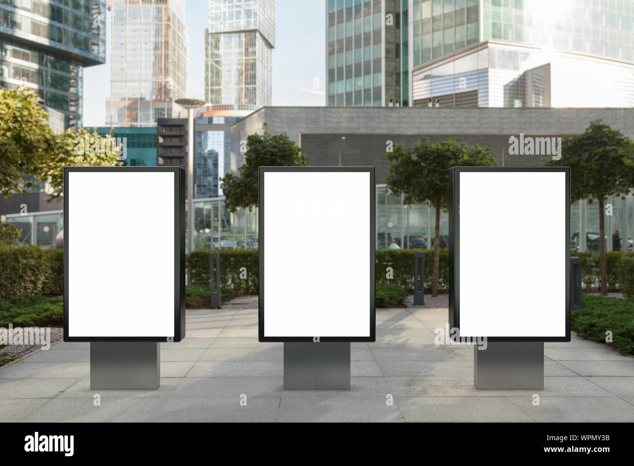 Three blank street billboard poster stands mock up on city business ...