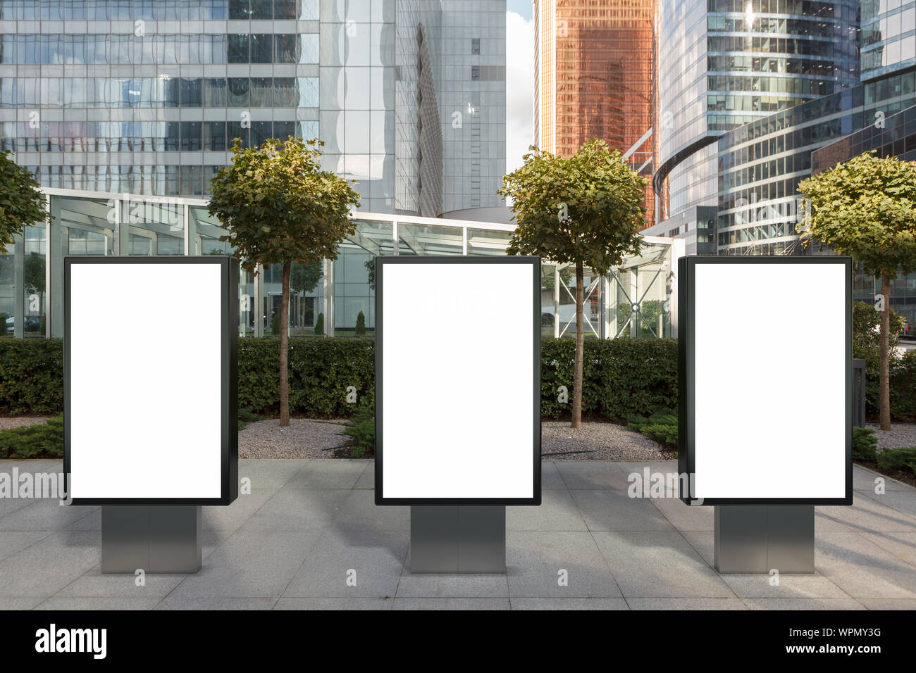 Three blank street billboard poster stands mock up on city business ...