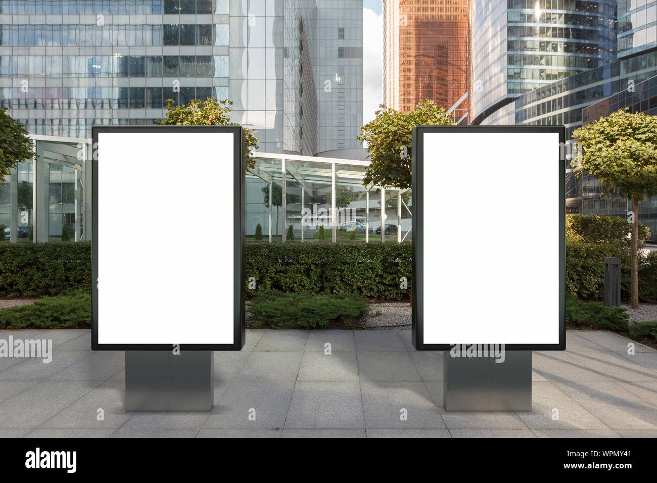 Two blank street billboard poster stands mock up on city business ...