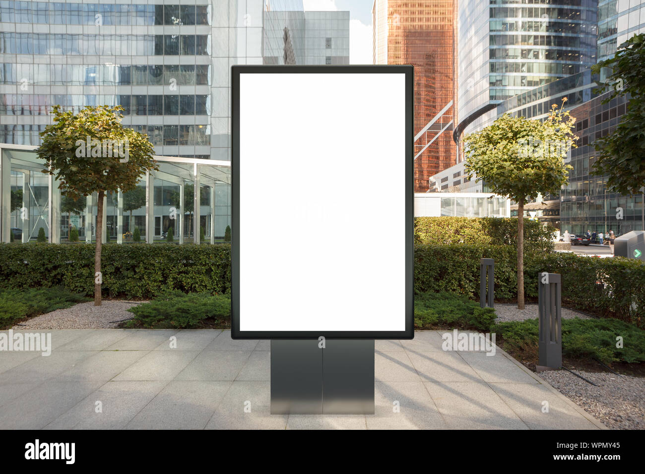 Blank street billboard poster stand mock up on city business district ...