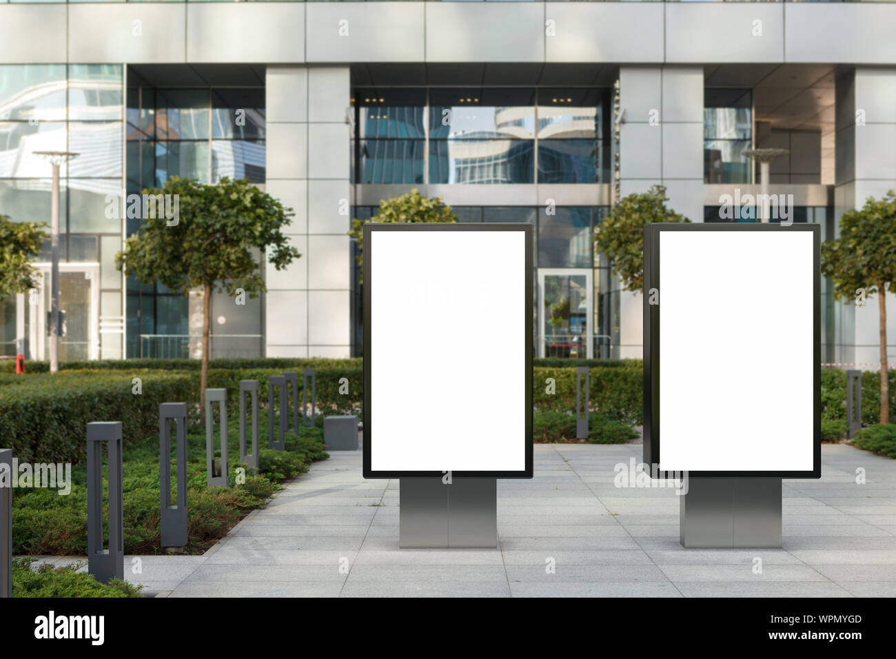 Two blank street billboard poster stands mock up on city business ...