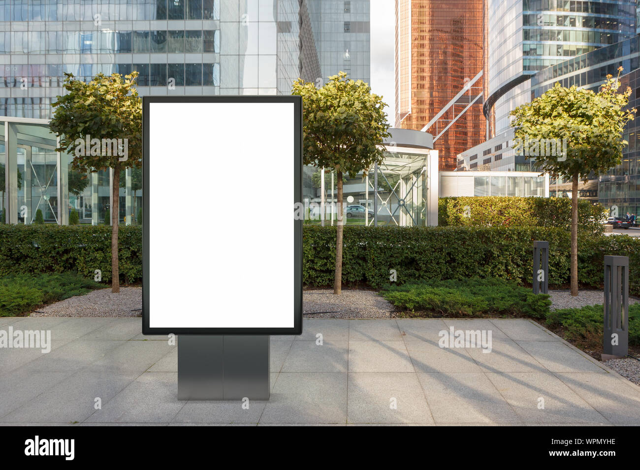Blank street billboard poster stand mock up on city business district ...