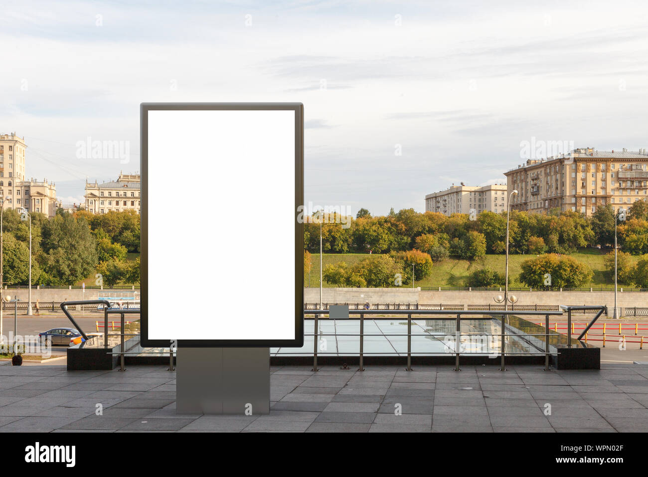 Blank street billboard poster stand mock up in downtown with city ...