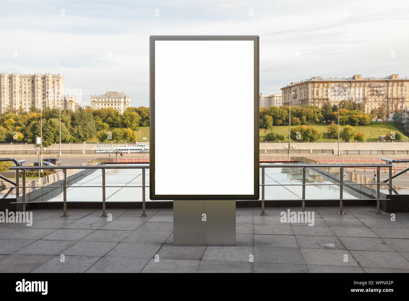 Blank street billboard poster stand mock up in downtown with city ...