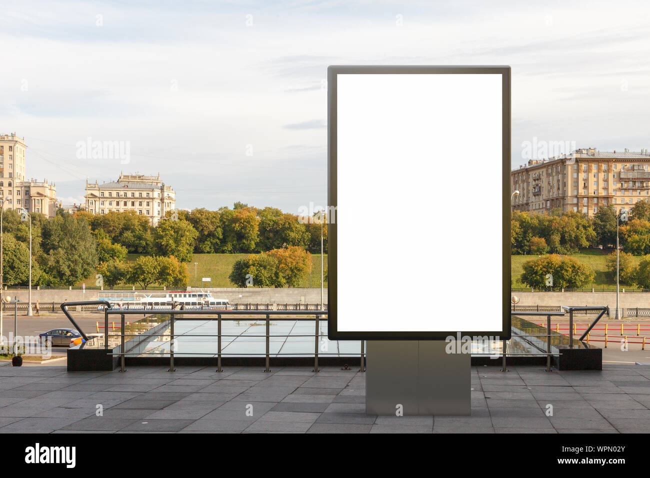 Blank street billboard poster stand mock up in downtown with city ...