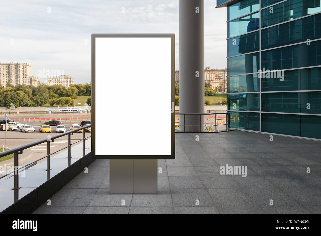 Blank street billboard poster stand mock up in downtown with city ...