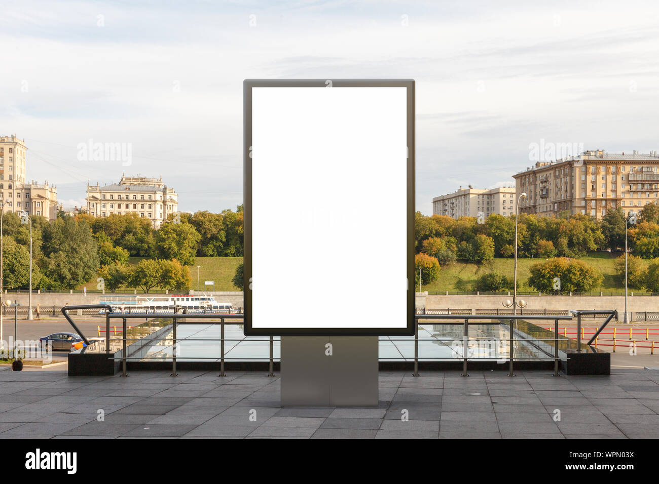 Blank street billboard poster stand mock up in downtown with city ...