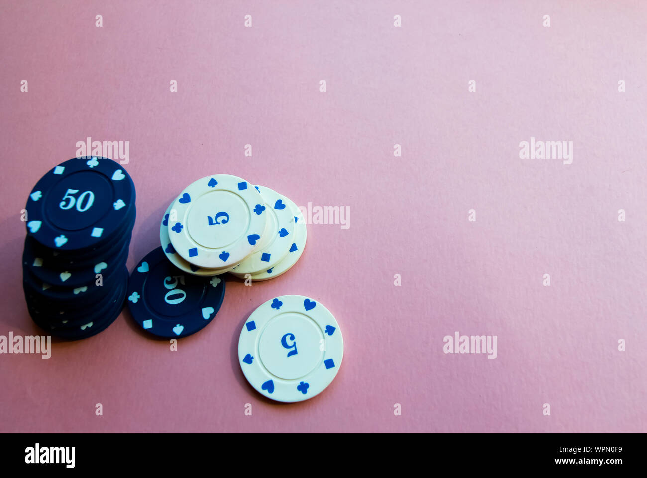 Chips for poker on pink background. Poker play. Copy space Stock Photo ...