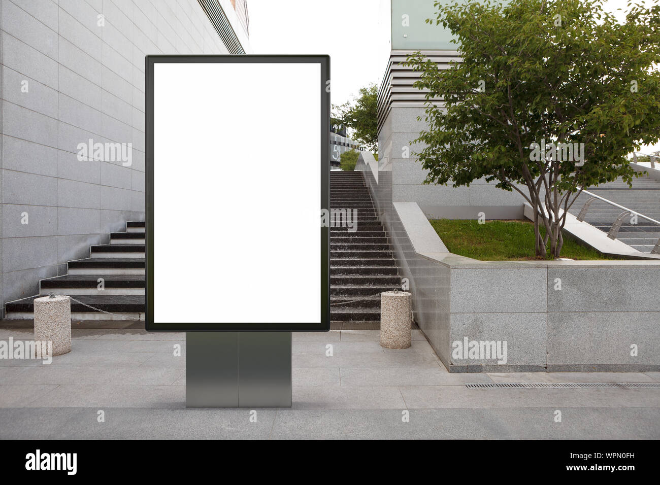 Blank street billboard poster stand mock up in downtown Stock Photo - Alamy