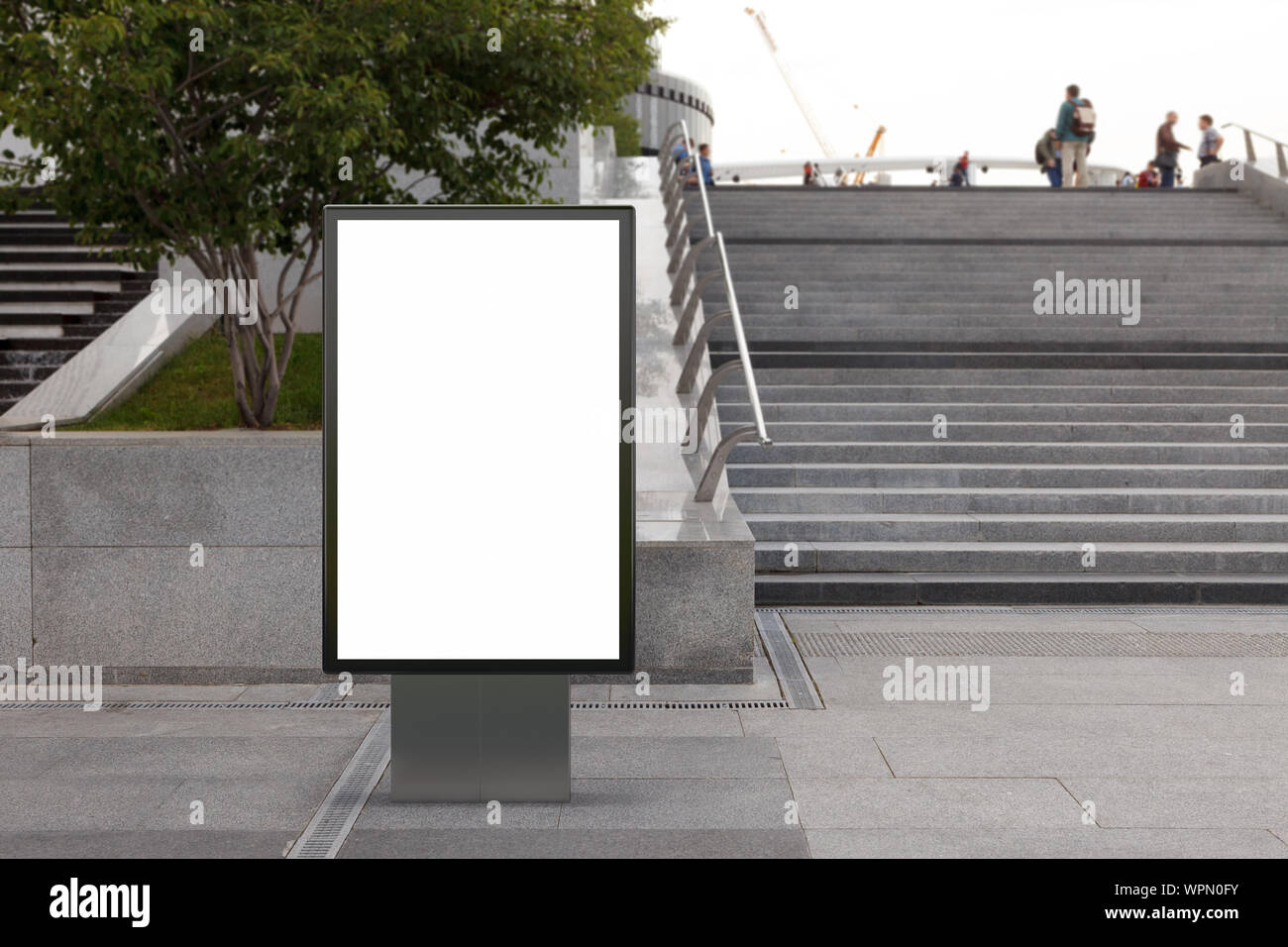 Blank street billboard poster stand mock up in downtown Stock Photo - Alamy