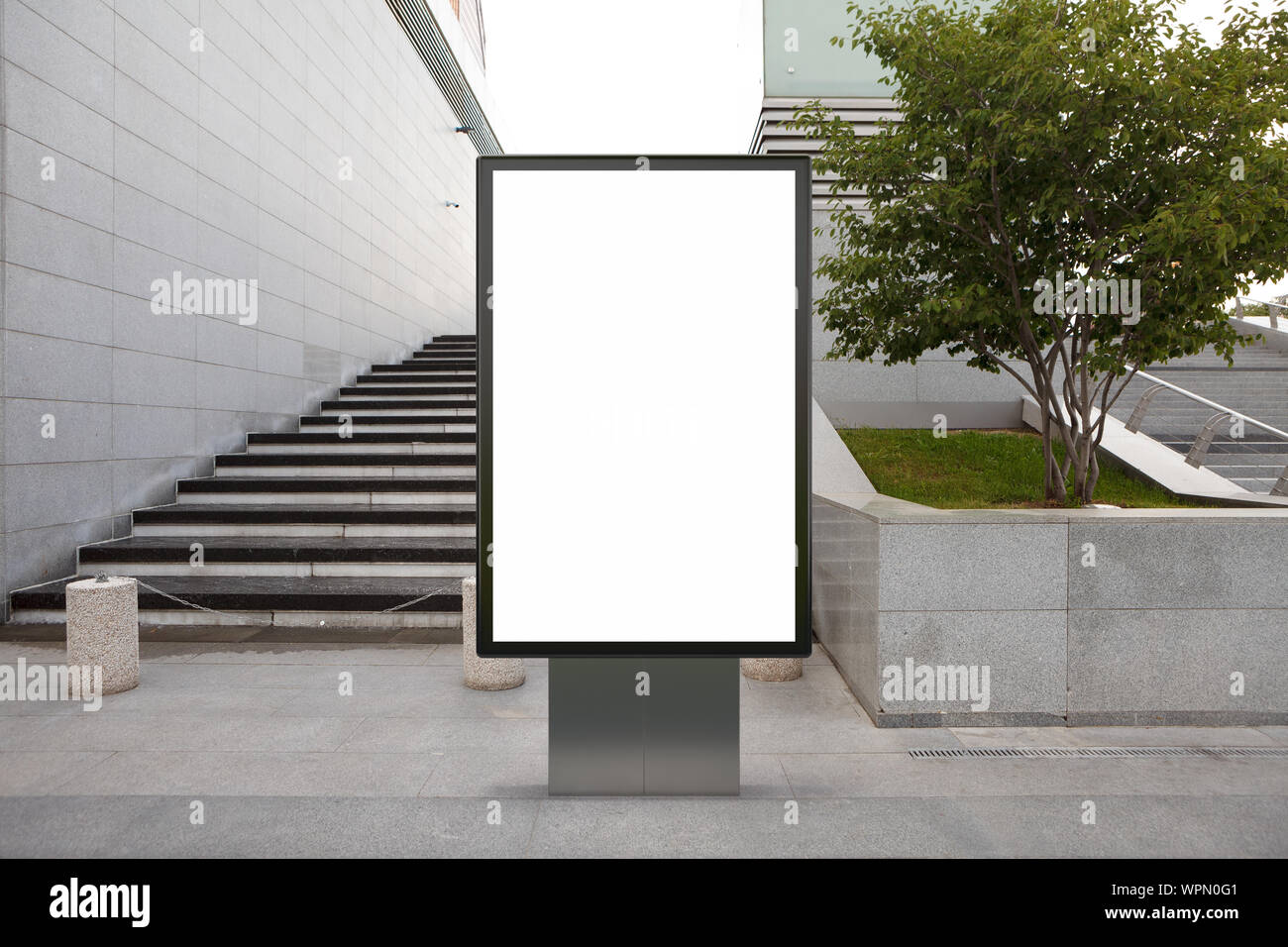 Blank street billboard poster stand mock up in downtown Stock Photo - Alamy