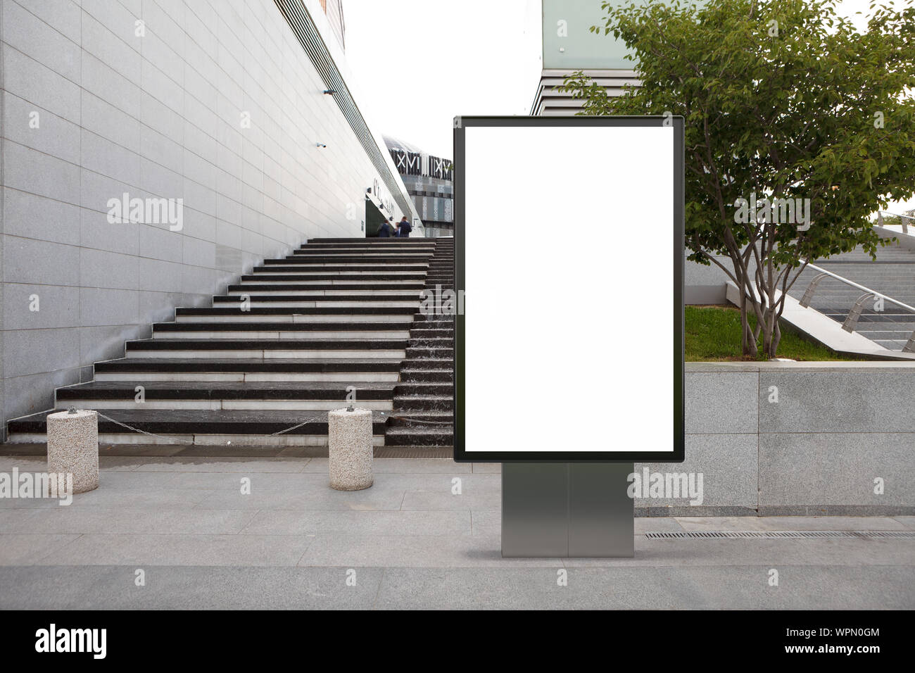 Blank street billboard poster stand mock up in downtown Stock Photo - Alamy