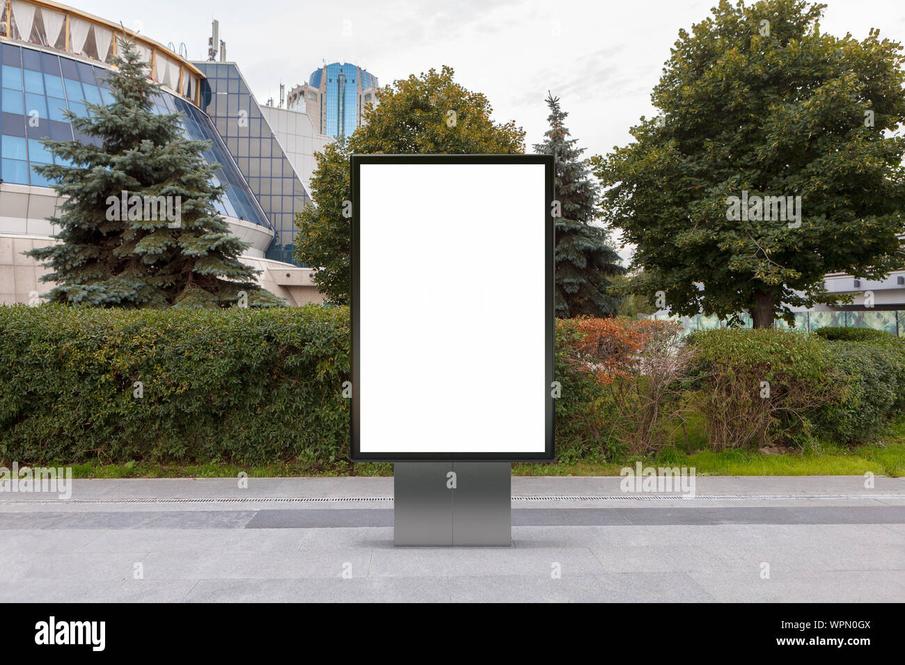 Blank street billboard poster stand mock up in downtown Stock Photo - Alamy