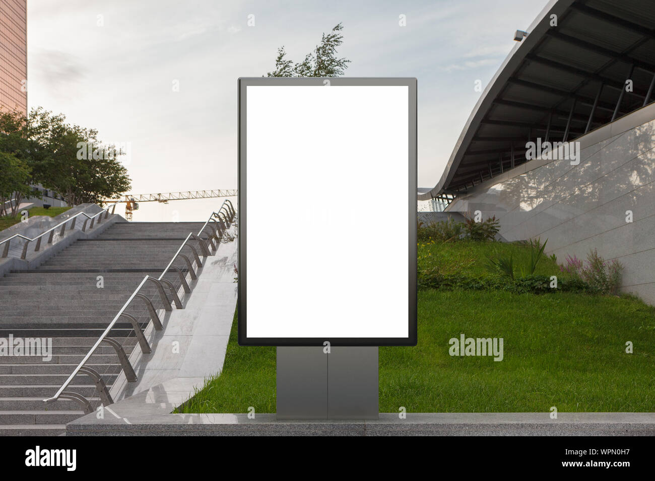 Blank street billboard poster stand mock up in downtown Stock Photo - Alamy