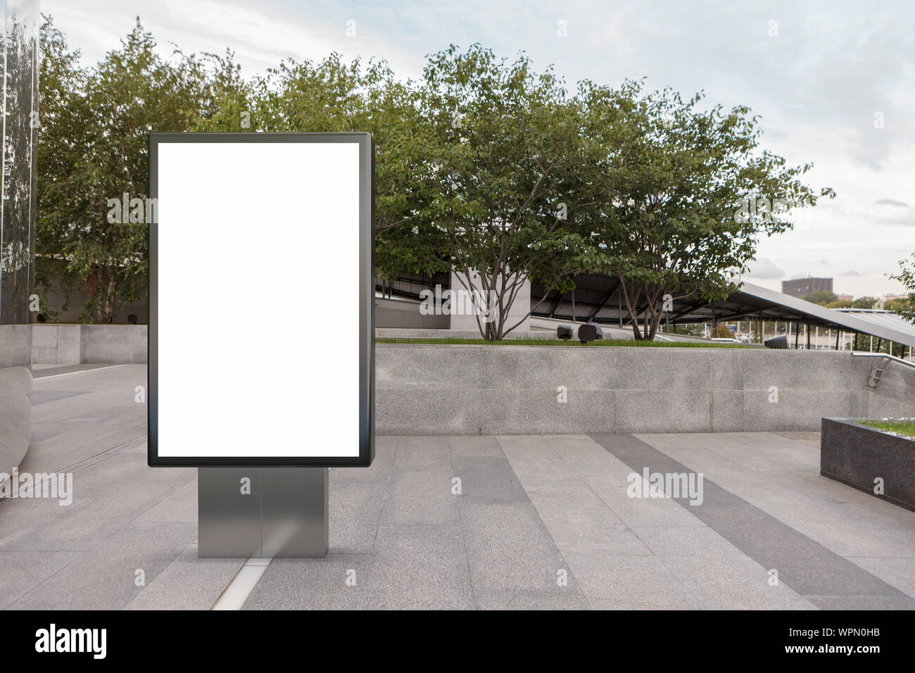 Blank street billboard poster stand mock up in downtown Stock Photo - Alamy