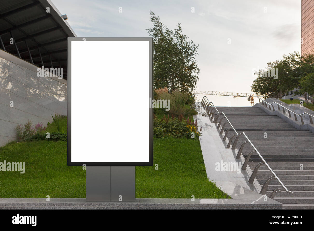 Blank street billboard poster stand mock up in downtown Stock Photo - Alamy