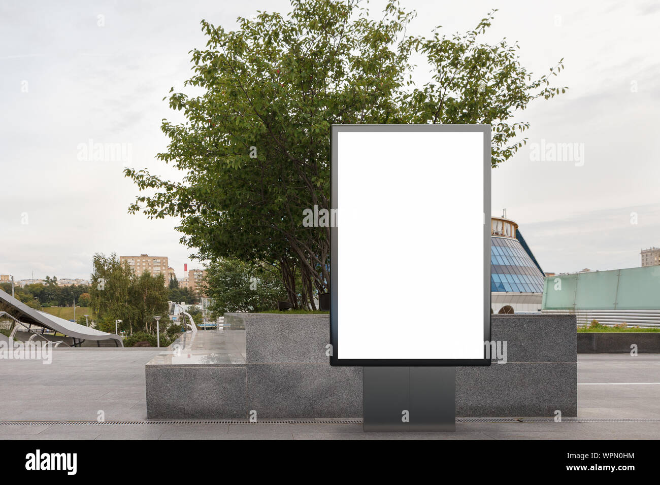Blank street billboard poster stand mock up in downtown Stock Photo - Alamy