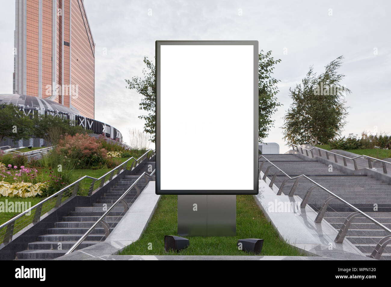 Blank street billboard poster stand mock up in on the lawn in the ...