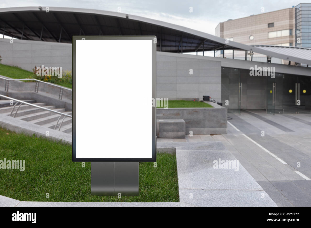 Blank street billboard poster stand mock up in on the lawn in the ...