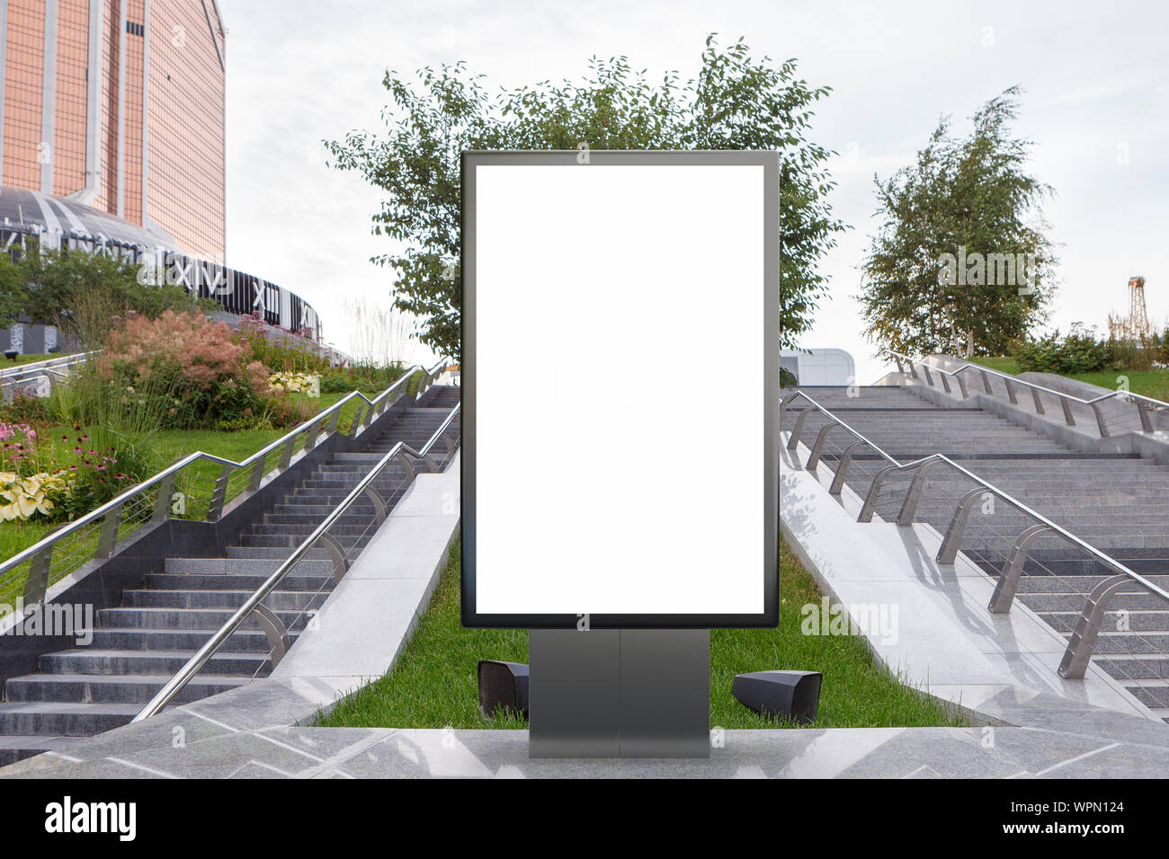 Blank street billboard poster stand mock up in on the lawn in the ...