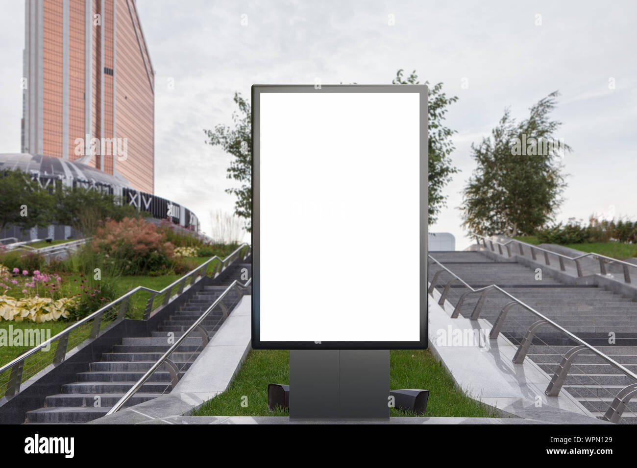 Blank street billboard poster stand mock up in on the lawn in the ...