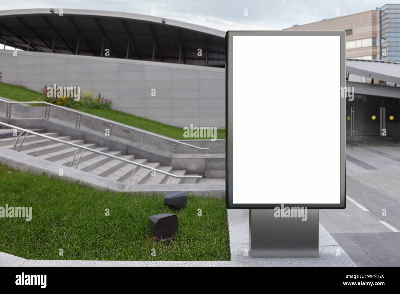Blank street billboard poster stand mock up in downtown Stock Photo - Alamy