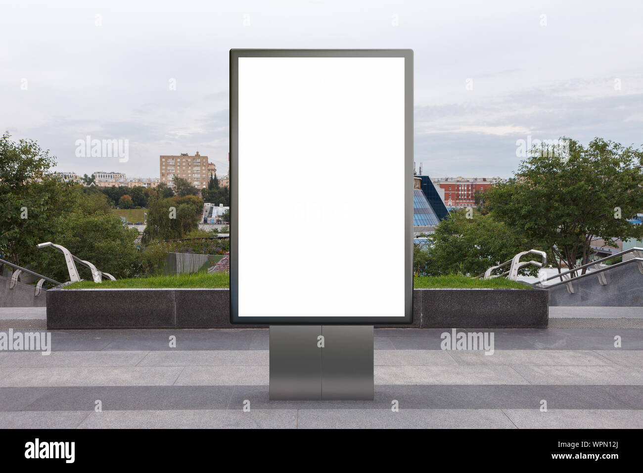 Blank street billboard poster stand mock up in downtown Stock Photo - Alamy