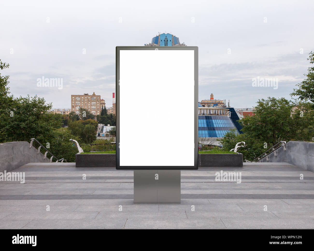 Blank street billboard poster stand mock up in downtown Stock Photo - Alamy