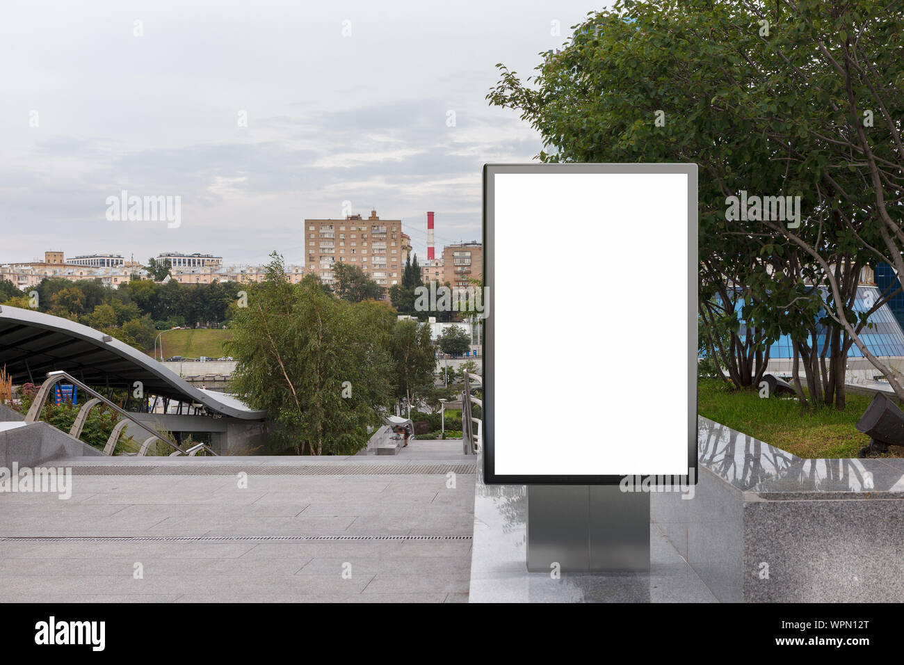 Blank street billboard poster stand mock up in downtown Stock Photo - Alamy
