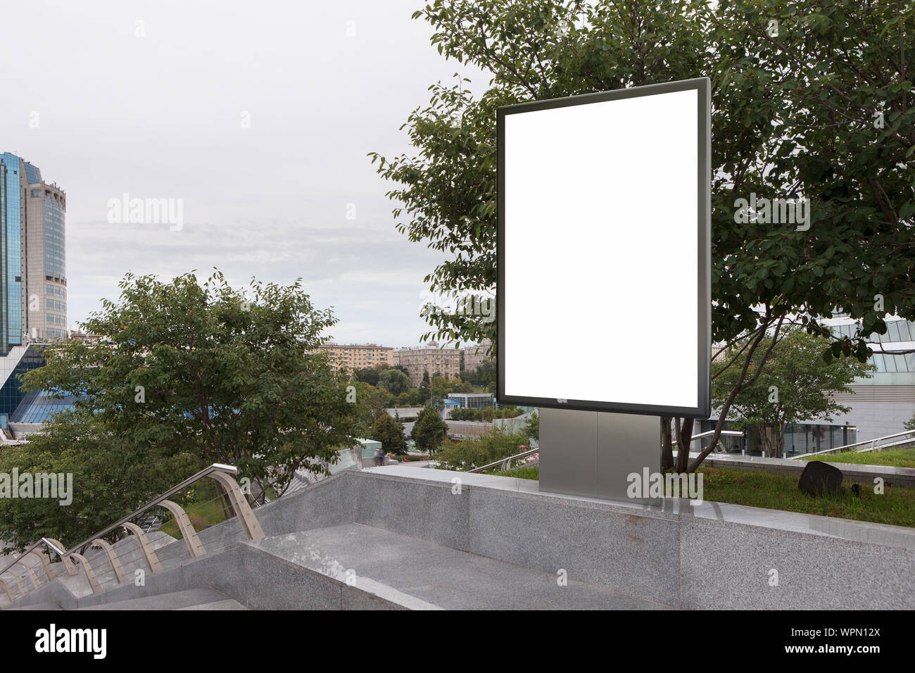 Blank street billboard poster stand mock up in downtown Stock Photo - Alamy